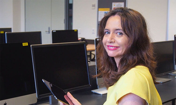 USQ lecturer in a computer lab