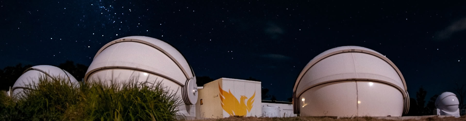 telescope domes under starry night
