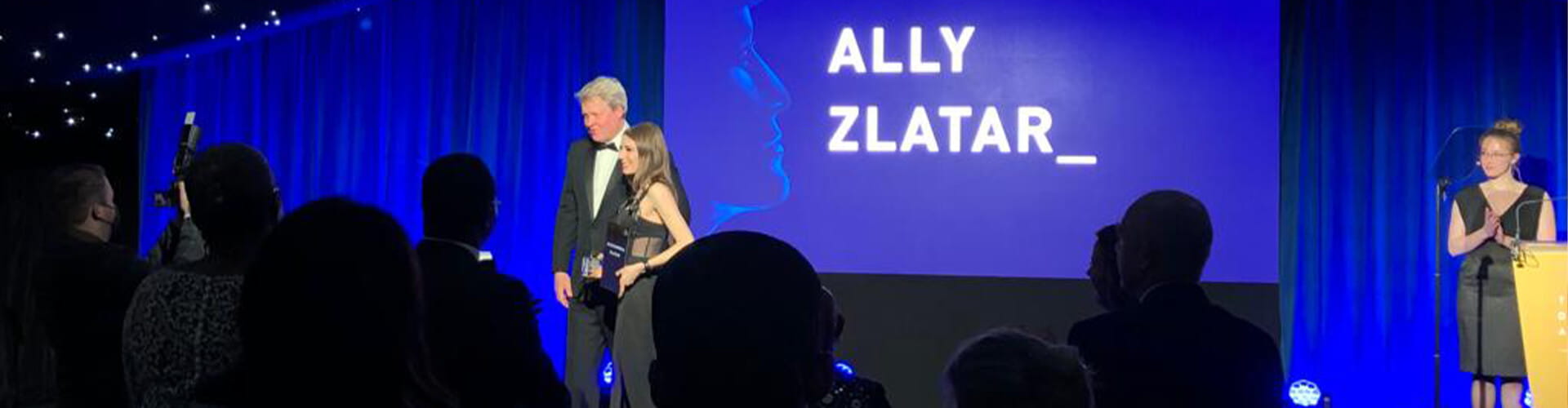 Ally Zlatar accepting an award.