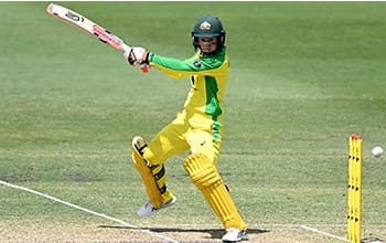 Rachel playing cricket for Australia.